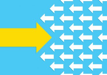 The Cost of Being Different